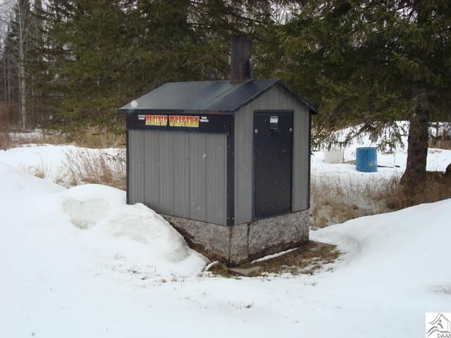 7595 Arkola Road Cotton, MN 55724 - Photo 14 of 14 Wood stove heats the in floor heat for the detached garage if you wish.