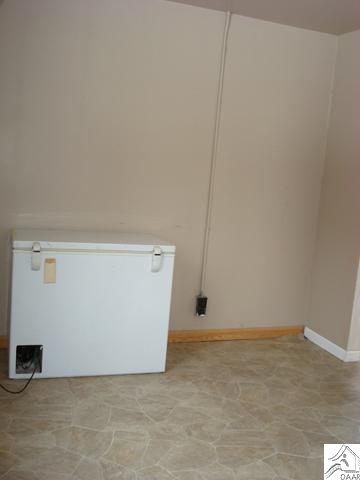 7595 Arkola Road Cotton, MN 55724 - Photo 10 of 14 Furnace/water heater and laundry hook-ups in this room along with extra space.