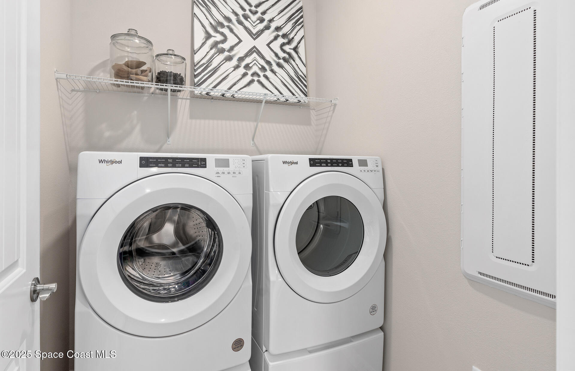3494 Bubbles Court Melbourne, FL 32901 - Photo 17 of 22 a utility room with dryer and washer