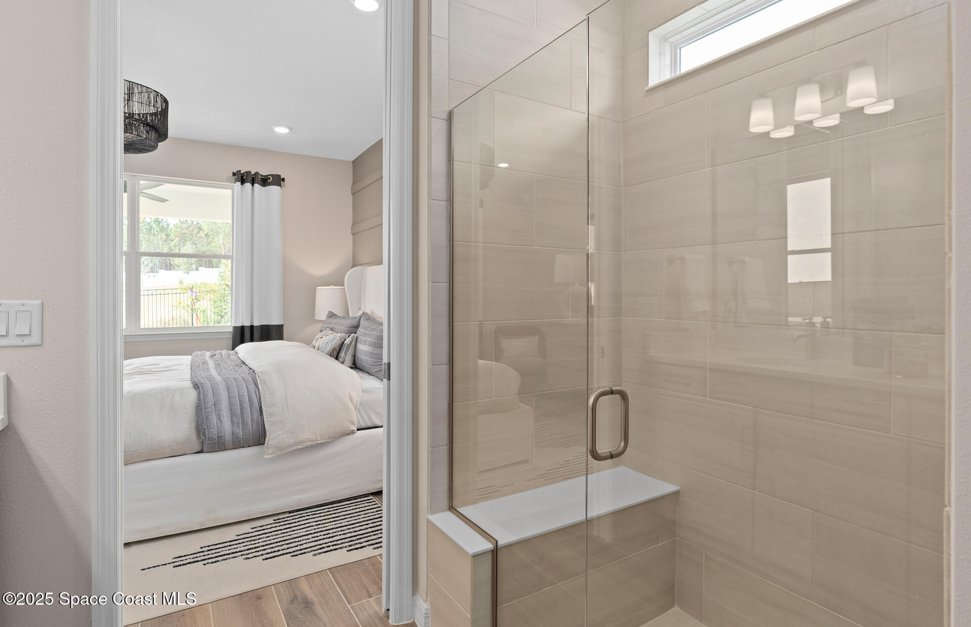 3494 Bubbles Court Melbourne, FL 32901 - Photo 22 of 22 a en suite bathroom with a shower