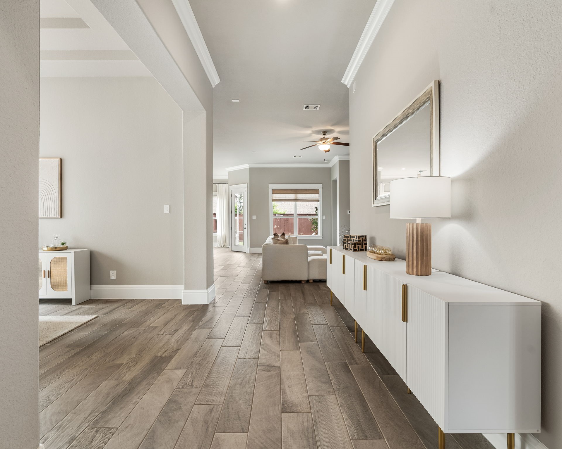 2206 Rope Maker Road Conroe, TX 77384 - Photo 14 of 42 Open foyer with soaring ceilings and wood-look tile through main living areas.