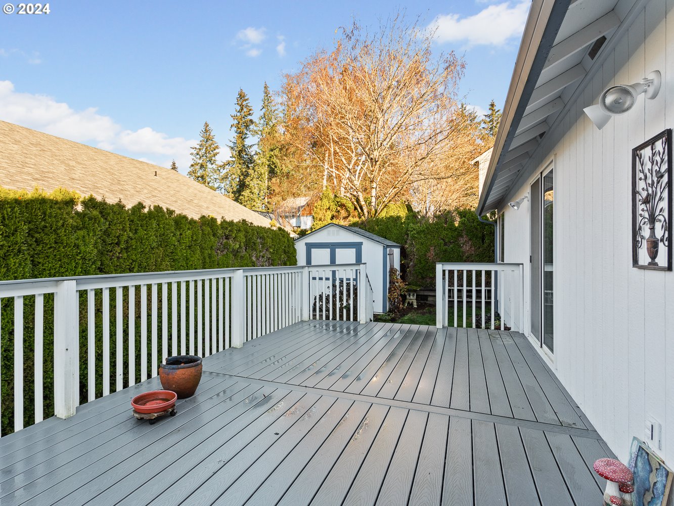 1180 North 1st Avenue Ridgefield, WA 98642 - Photo 32 of 48 a balcony with wooden floor and stairs