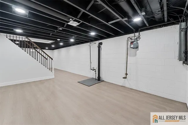 a view of a wooden deck with a yard