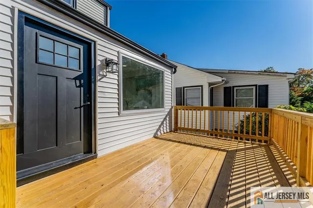 a view of a dry yard with a house