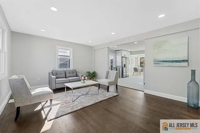 a living room with furniture and a table