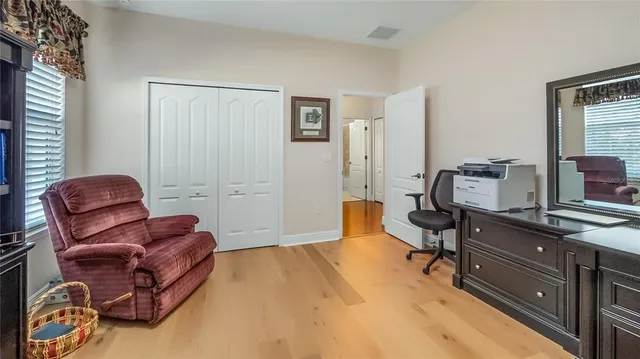 a view of entryway with wooden floor