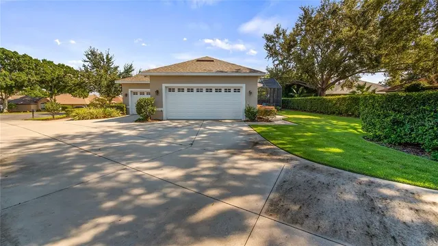 a view of a swimming pool with an outdoor space and seating area