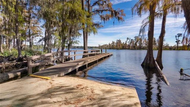 a view of outdoor space with a garden and signage