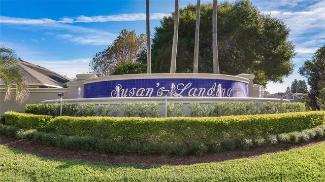 an aerial view of a house with a lake view