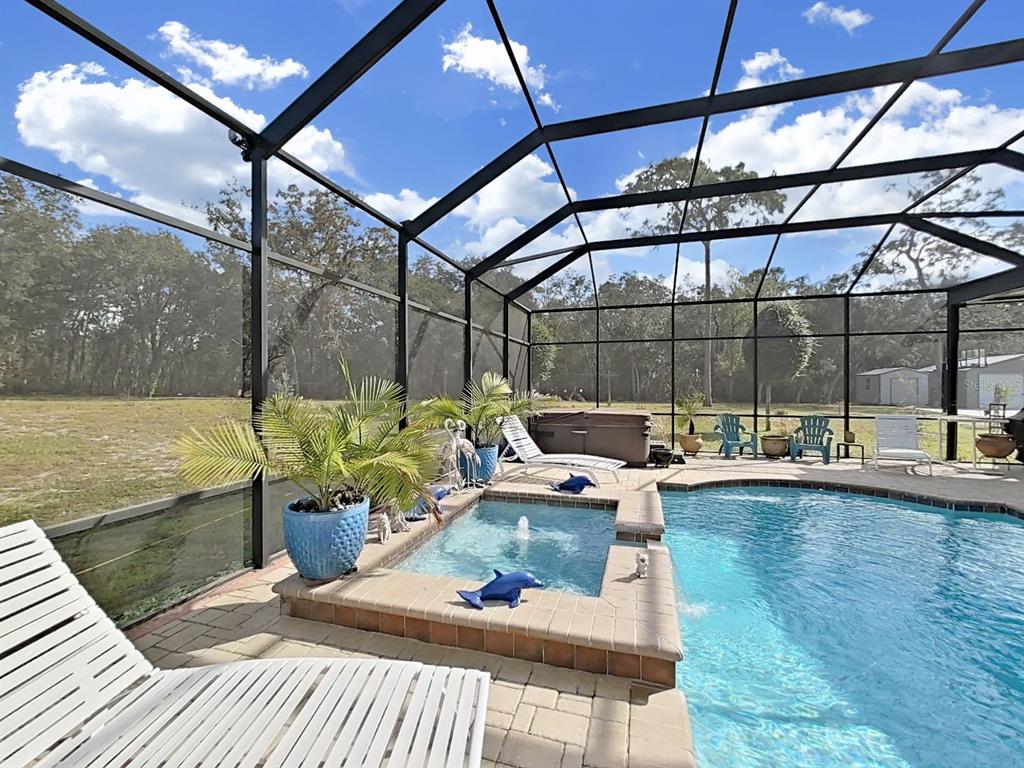 10639 Brave Lane Hudson, FL 34667 - Photo 31 of 54 a view of a terrace with seating space