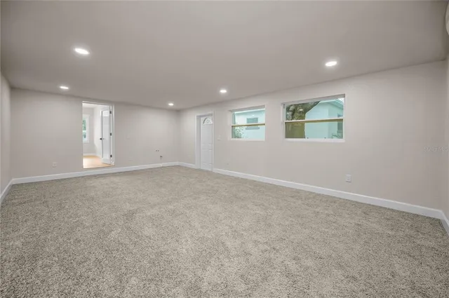 an empty room with windows