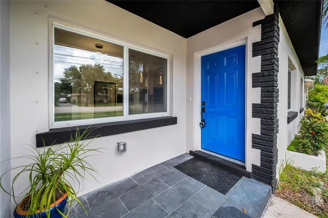a view of balcony with furniture