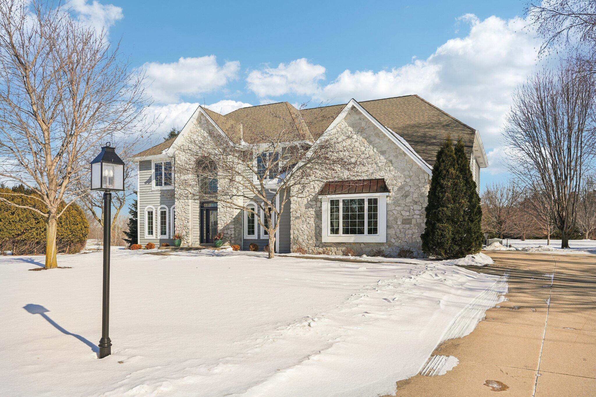 W331N3460 Maplewood Road Nashotah, WI 53058 - Photo 8 of 78 Refreshed landscaping in front of home