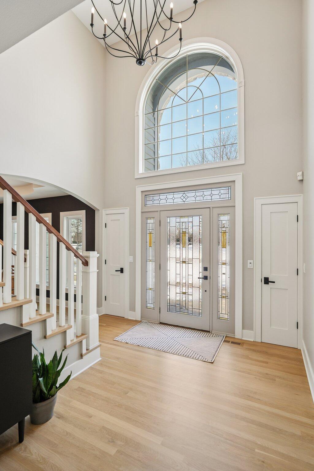 W331N3460 Maplewood Road Nashotah, WI 53058 - Photo 9 of 78 Two story foyer and remodeled staircase