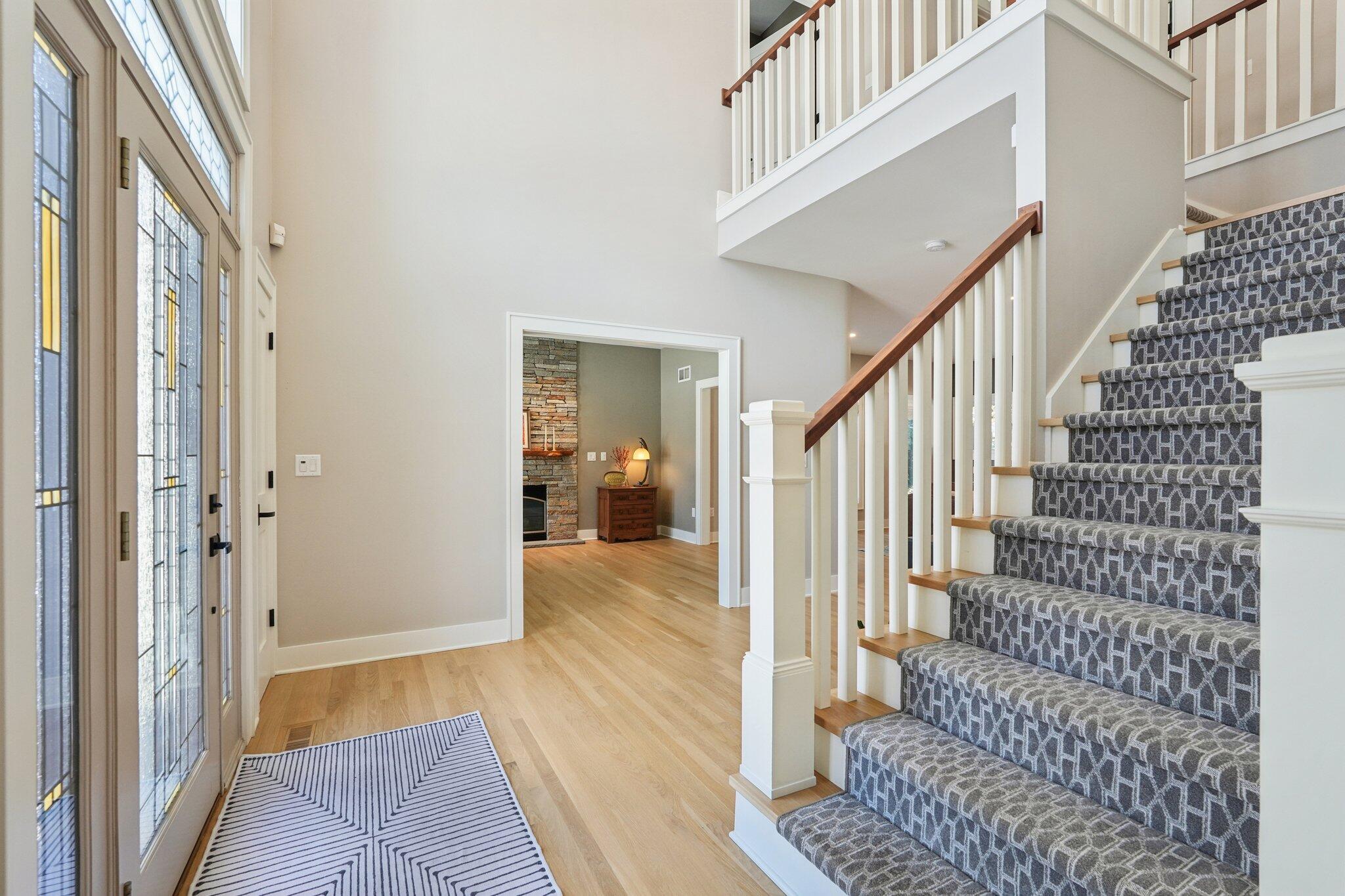 W331N3460 Maplewood Road Nashotah, WI 53058 - Photo 10 of 78 Stunning entrance and open staircase