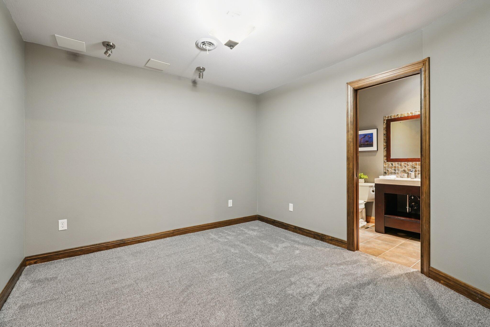 W331N3460 Maplewood Road Nashotah, WI 53058 - Photo 63 of 78 Bedroom in the LL and full bath!