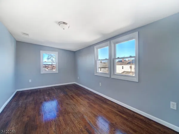 an empty room that has a window