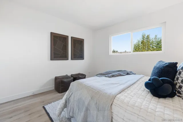 a bedroom with a bed and closet