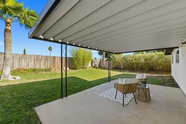 a view of a room with wooden walls
