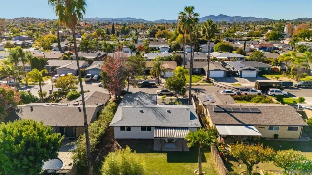 an aerial view of residential house with parking space