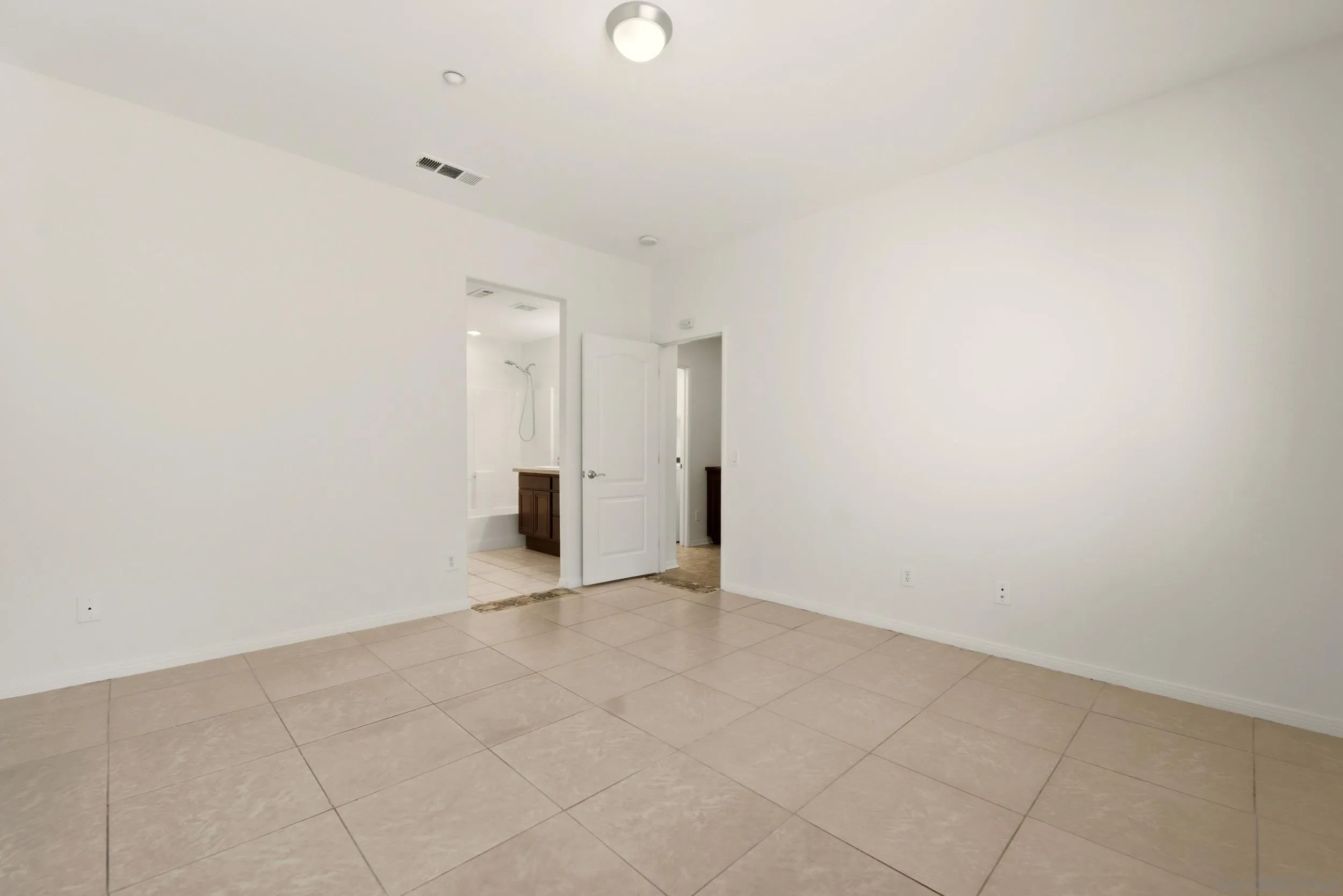 16953 New Rochelle Way, Unit 62 San Diego, CA 92127 - Photo 14 of 21 a view of an empty room with a window