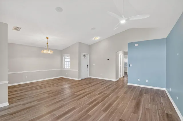 a kitchen with a sink stove and refrigerator