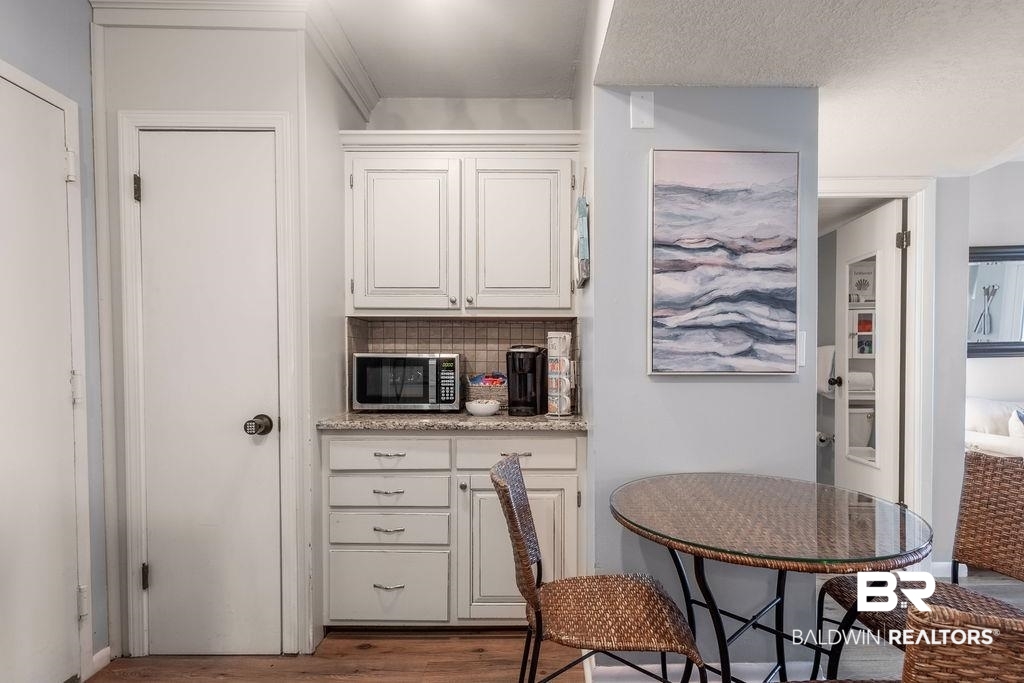 375 Plantation Road, Unit 5502 Gulf Shores, AL 36542 - Photo 8 of 27 This kitchen offers bonus cabinetry and the perfect space for you to sit and enjoy meals.