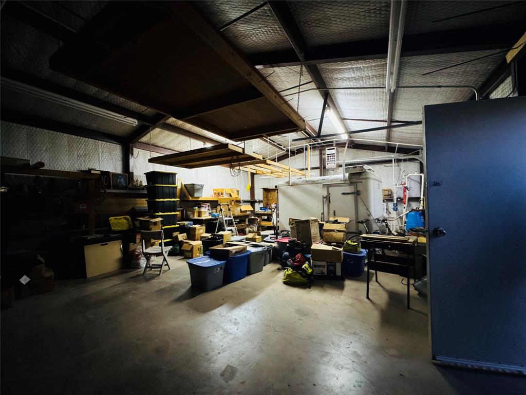 1111 East Sammy Baugh Avenue Rotan, TX 79546 - Photo 8 of 23 a view of a storage in a room