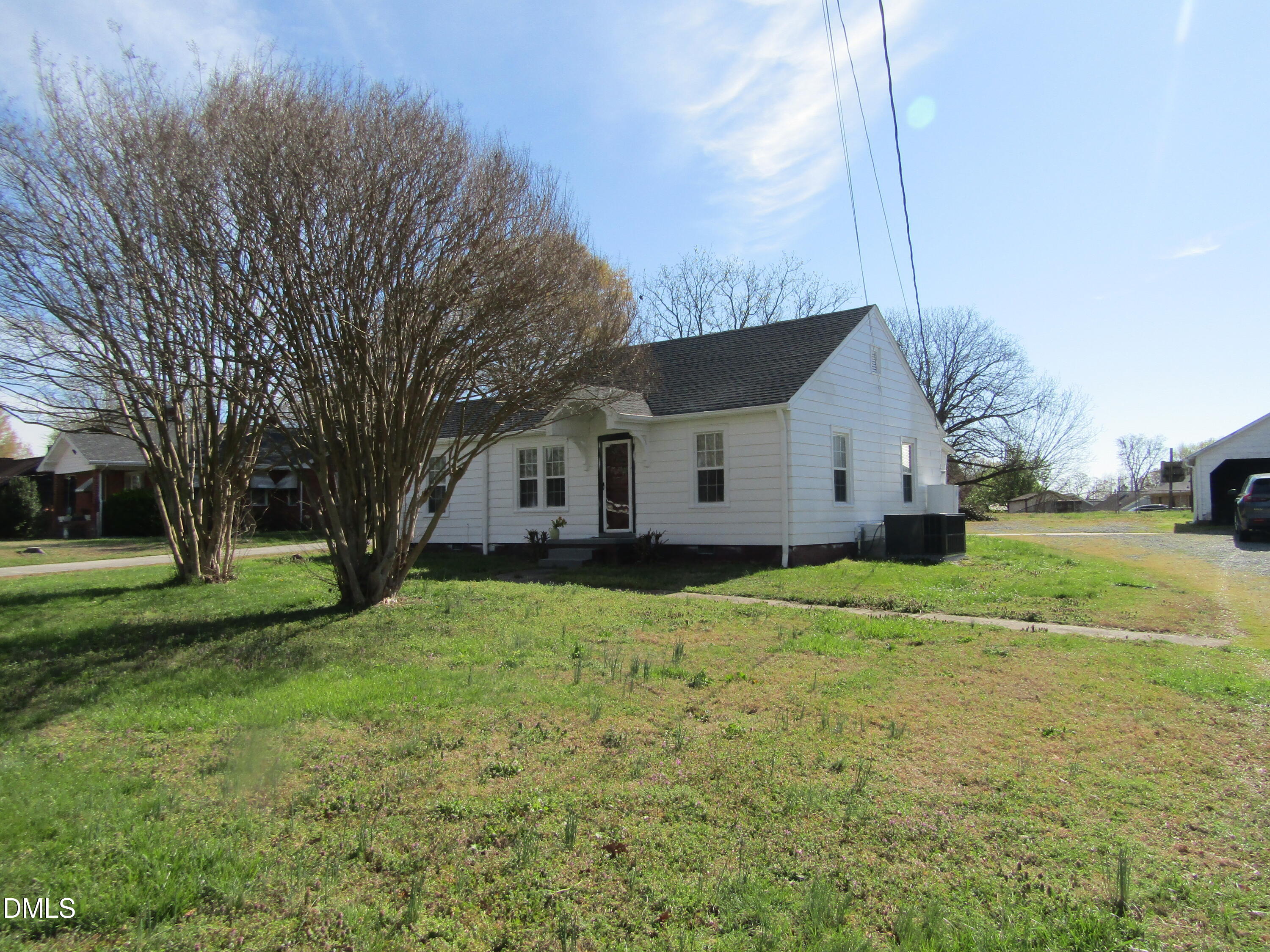 1719 Lower Hopedale Road Burlington, NC 27217 - Photo 12 of 12 a view of a house with a yard