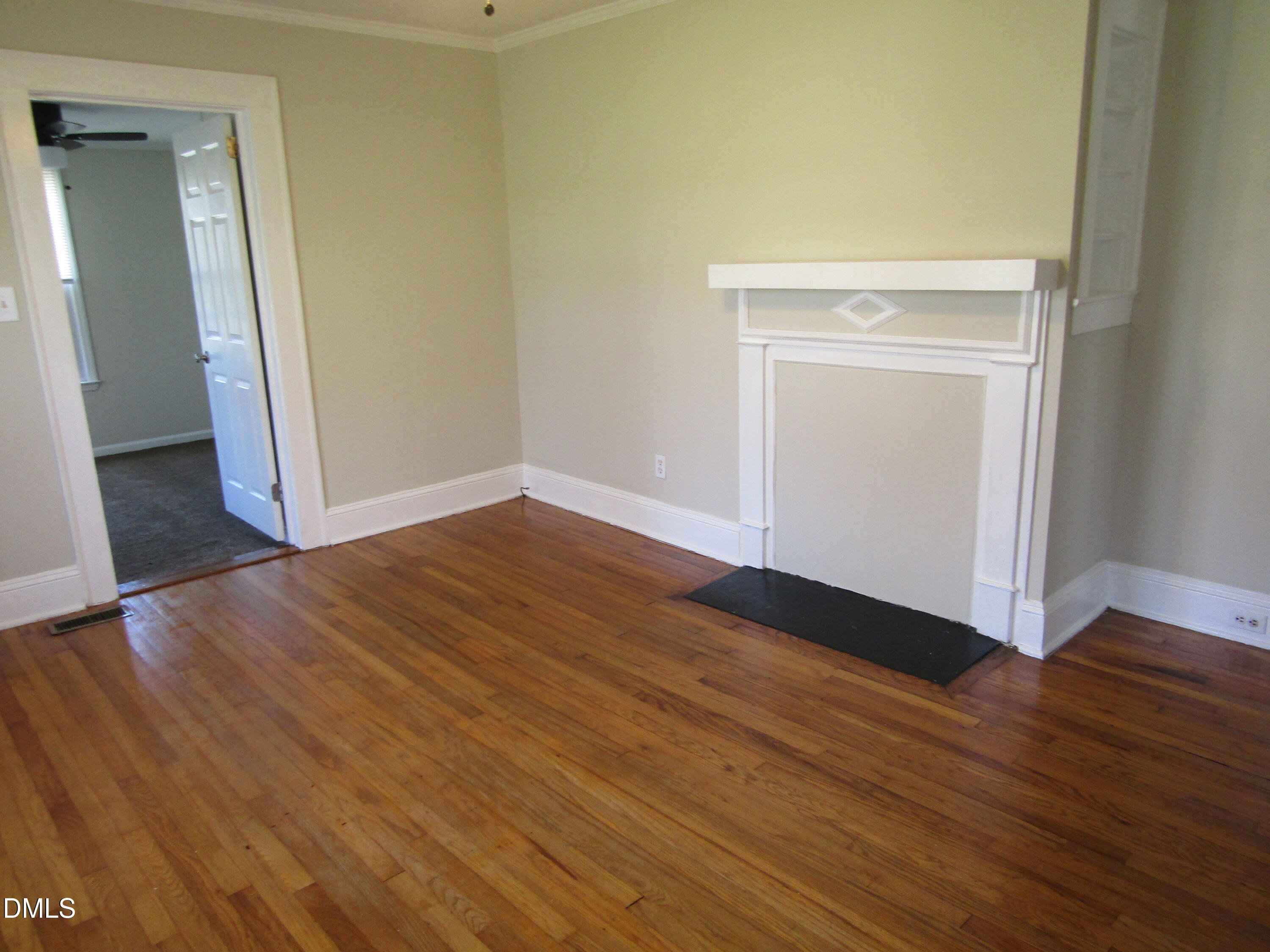 1719 Lower Hopedale Road Burlington, NC 27217 - Photo 2 of 12 a view of empty room with wooden floor