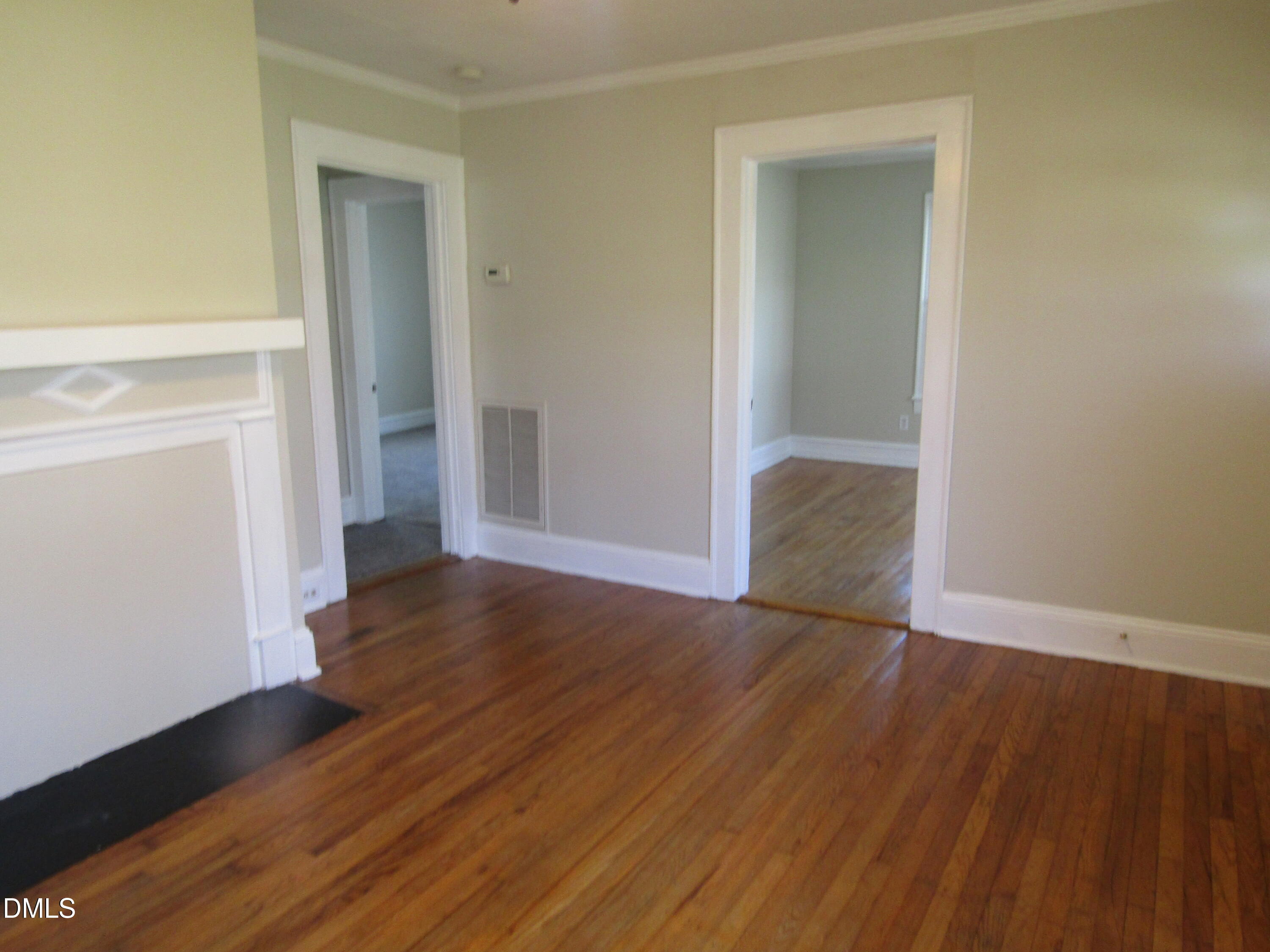 1719 Lower Hopedale Road Burlington, NC 27217 - Photo 3 of 12 wooden floor in an empty room