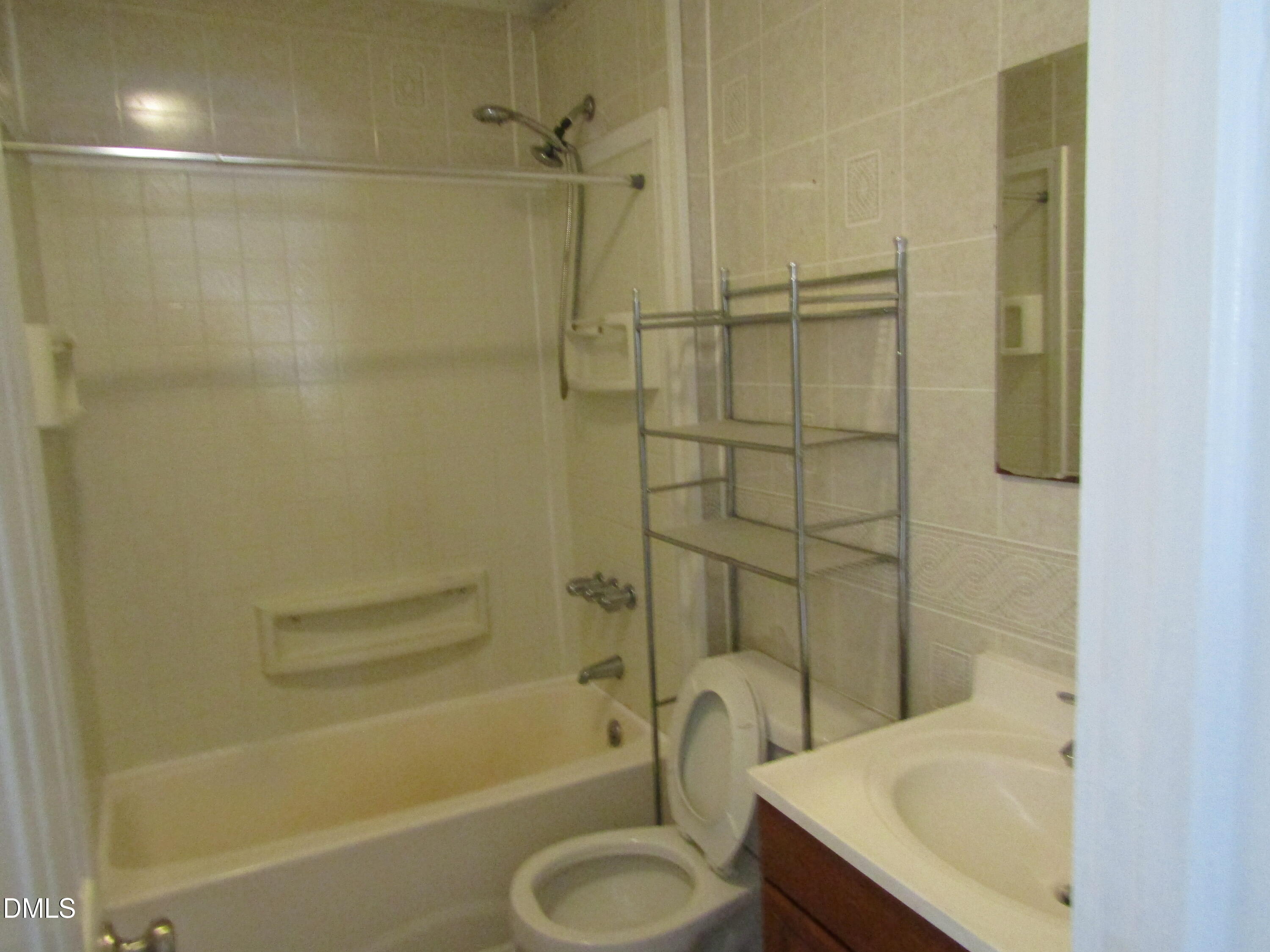 1719 Lower Hopedale Road Burlington, NC 27217 - Photo 8 of 12 a bathroom with a sink toilet and shower