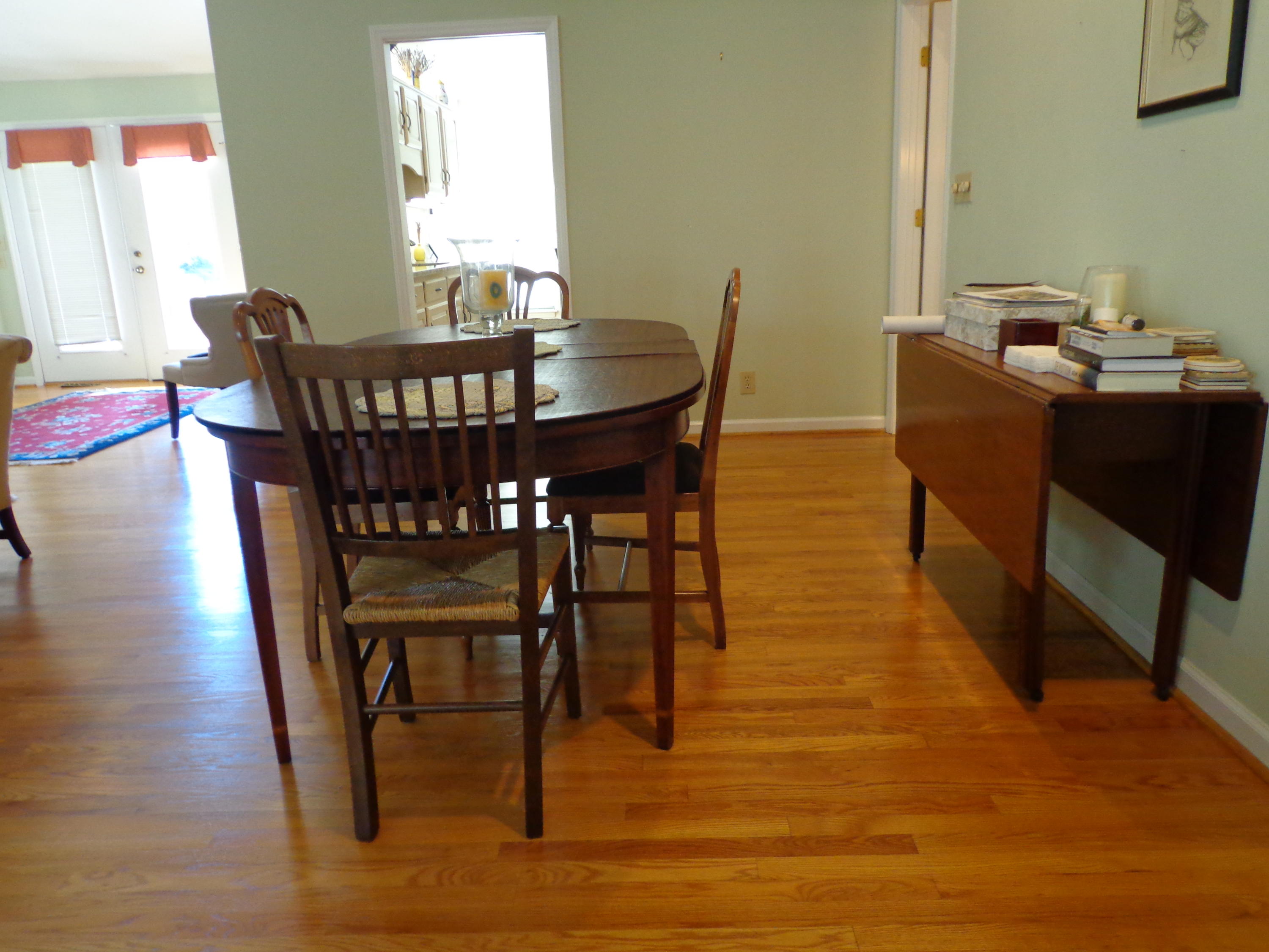 1908 McVitty Road Salem, VA 24153 - Photo 11 of 44 a view of a dining room with furniture window and wooden floor