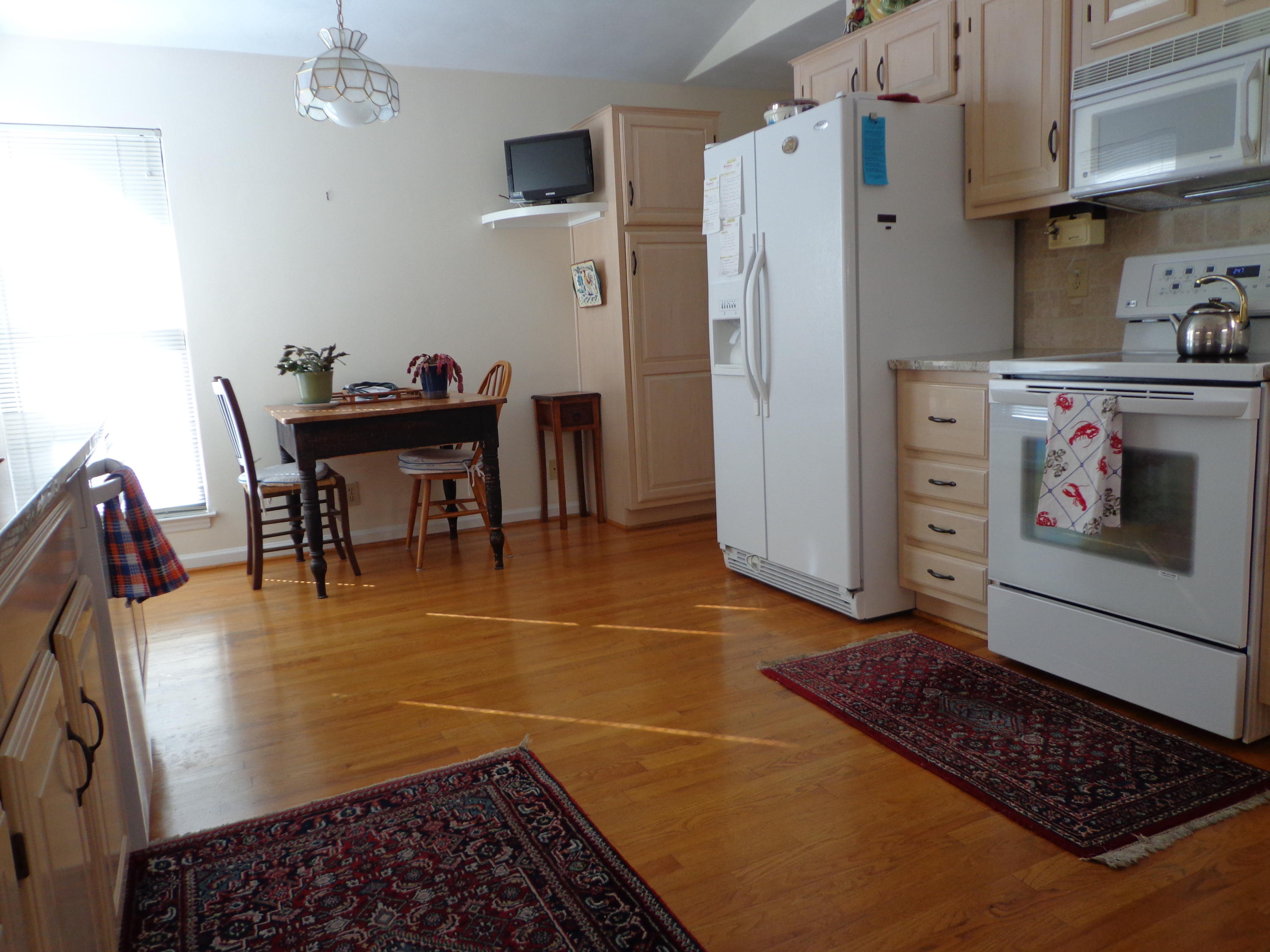 1908 McVitty Road Salem, VA 24153 - Photo 13 of 44 a kitchen with stainless steel appliances granite countertop a refrigerator and a stove top oven