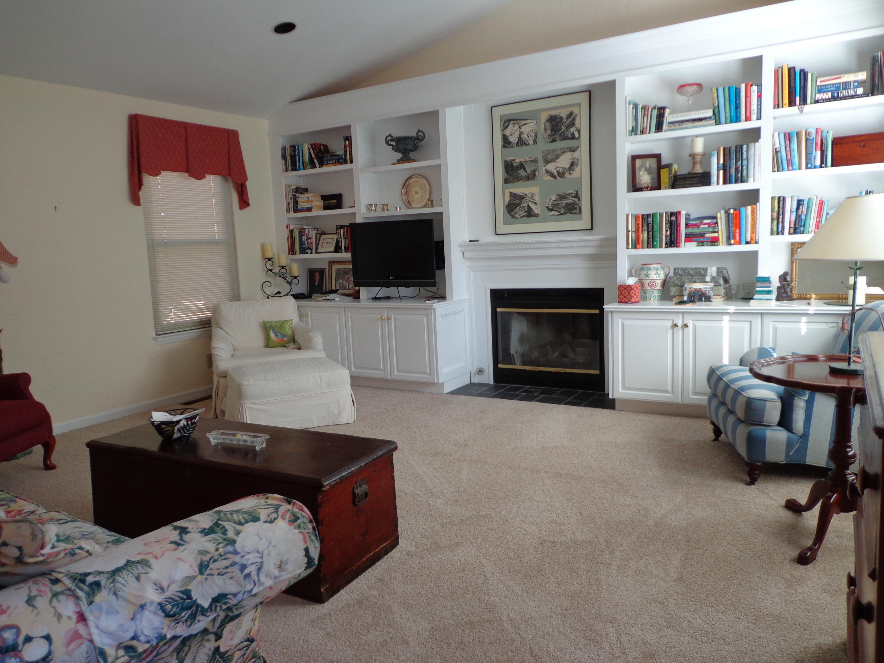 1908 McVitty Road Salem, VA 24153 - Photo 20 of 44 a living room with furniture and a fireplace
