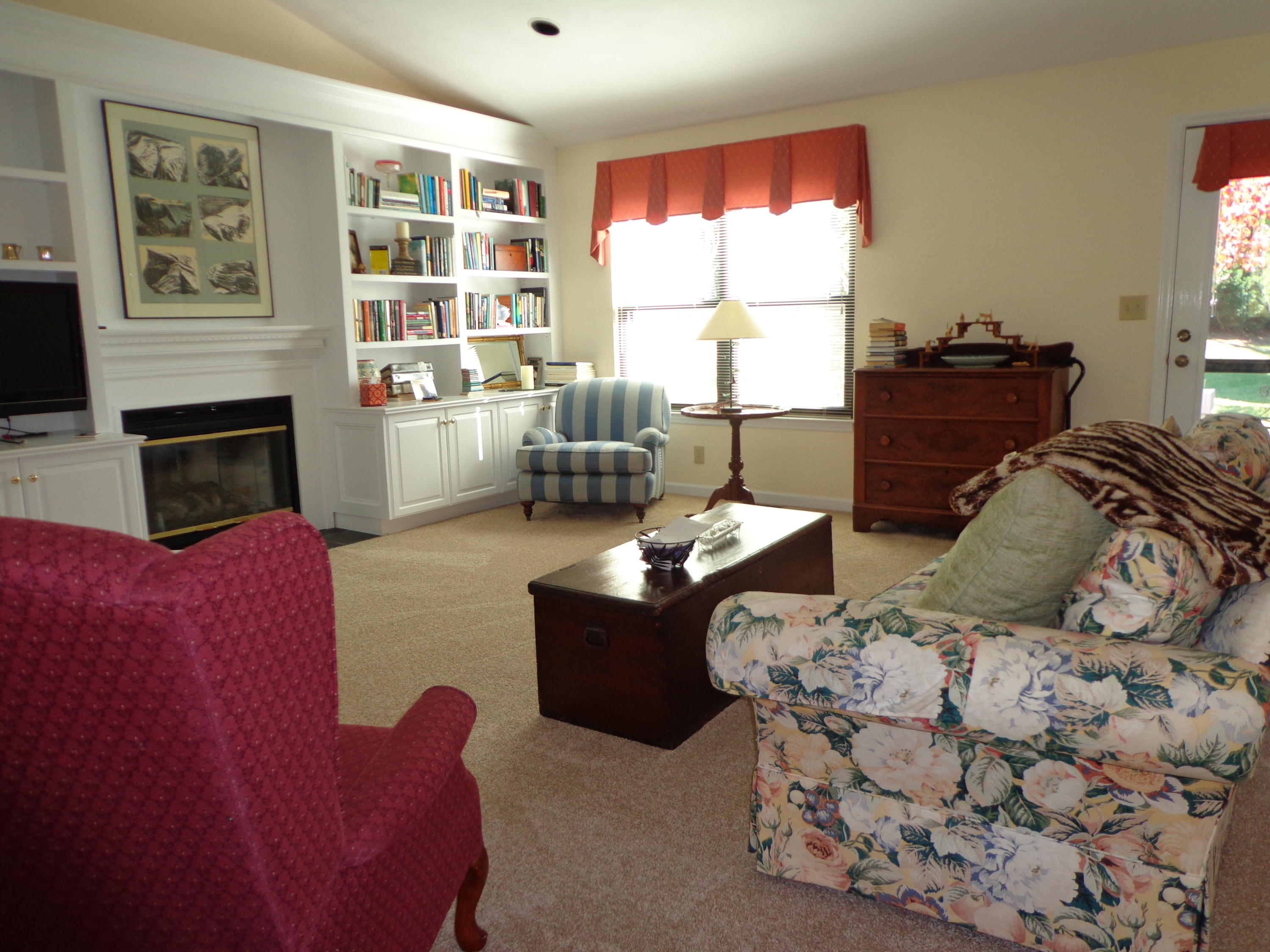 1908 McVitty Road Salem, VA 24153 - Photo 24 of 44 a living room with furniture window and a fireplace