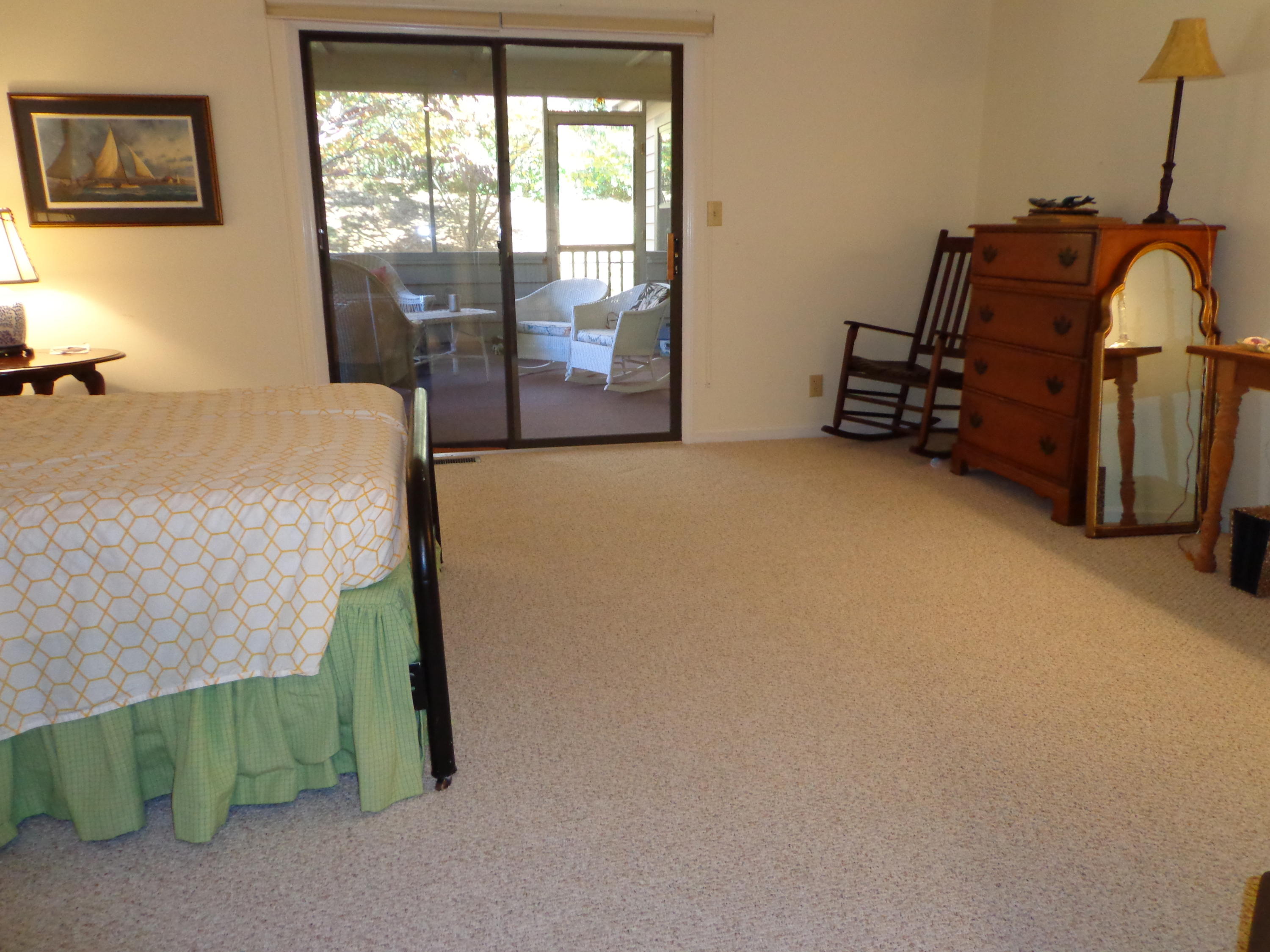 1908 McVitty Road Salem, VA 24153 - Photo 26 of 44 a bedroom with a bed and a mirror