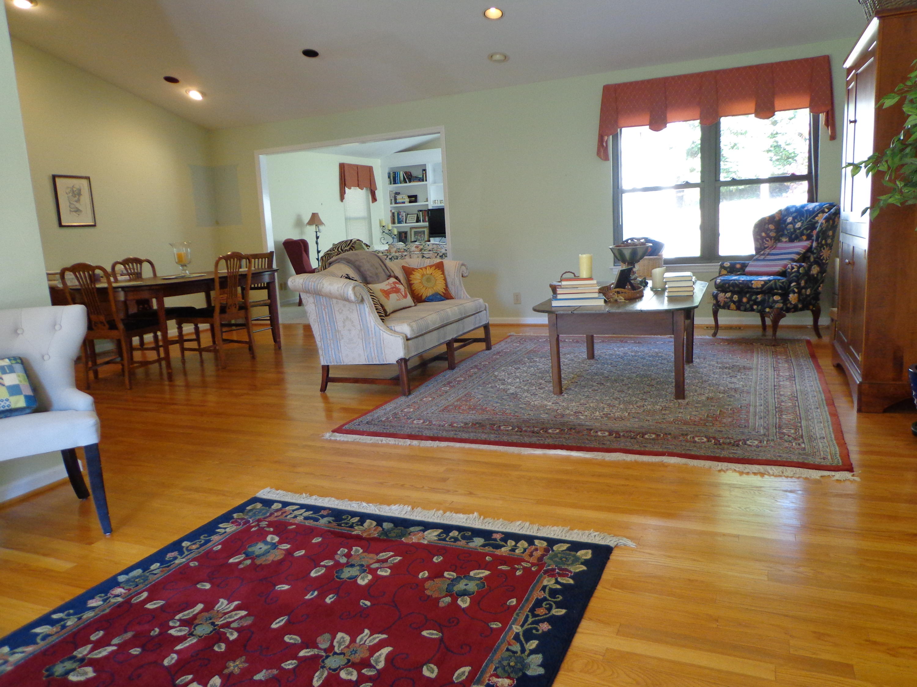 1908 McVitty Road Salem, VA 24153 - Photo 4 of 44 a living room with fireplace furniture and a large window