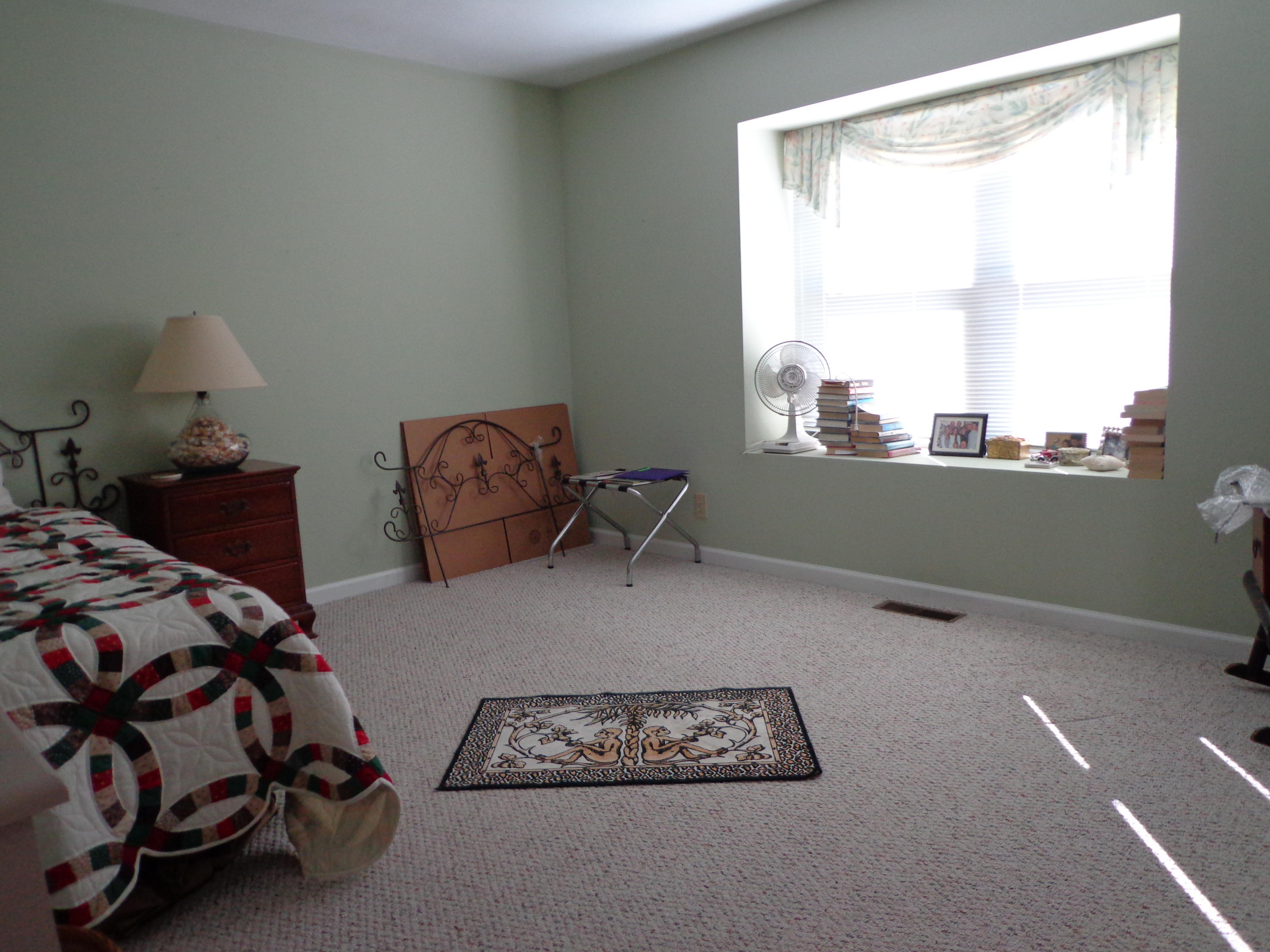 1908 McVitty Road Salem, VA 24153 - Photo 31 of 44 a bedroom with a bed and a window