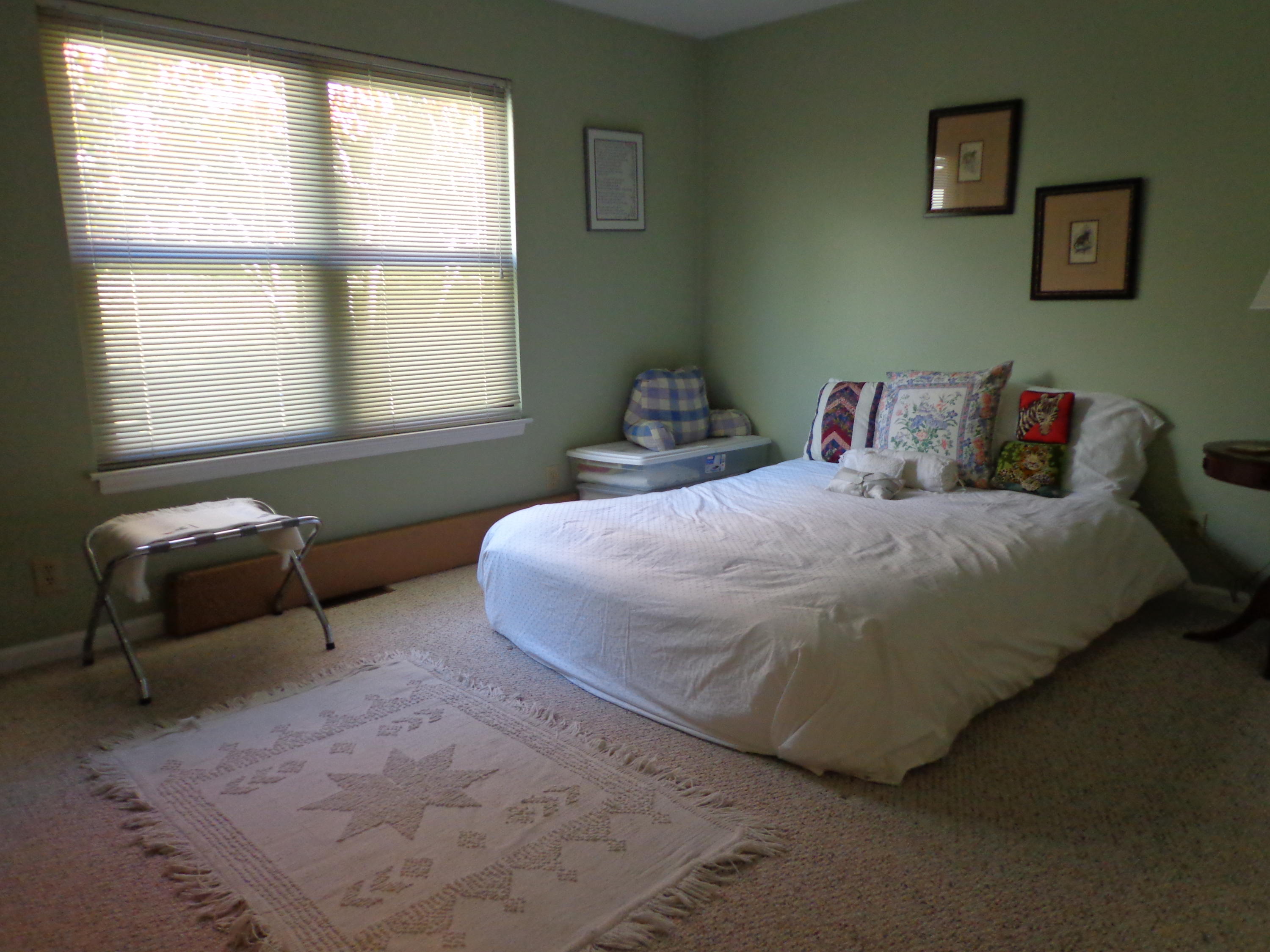 1908 McVitty Road Salem, VA 24153 - Photo 33 of 44 a bedroom with a bed and a window