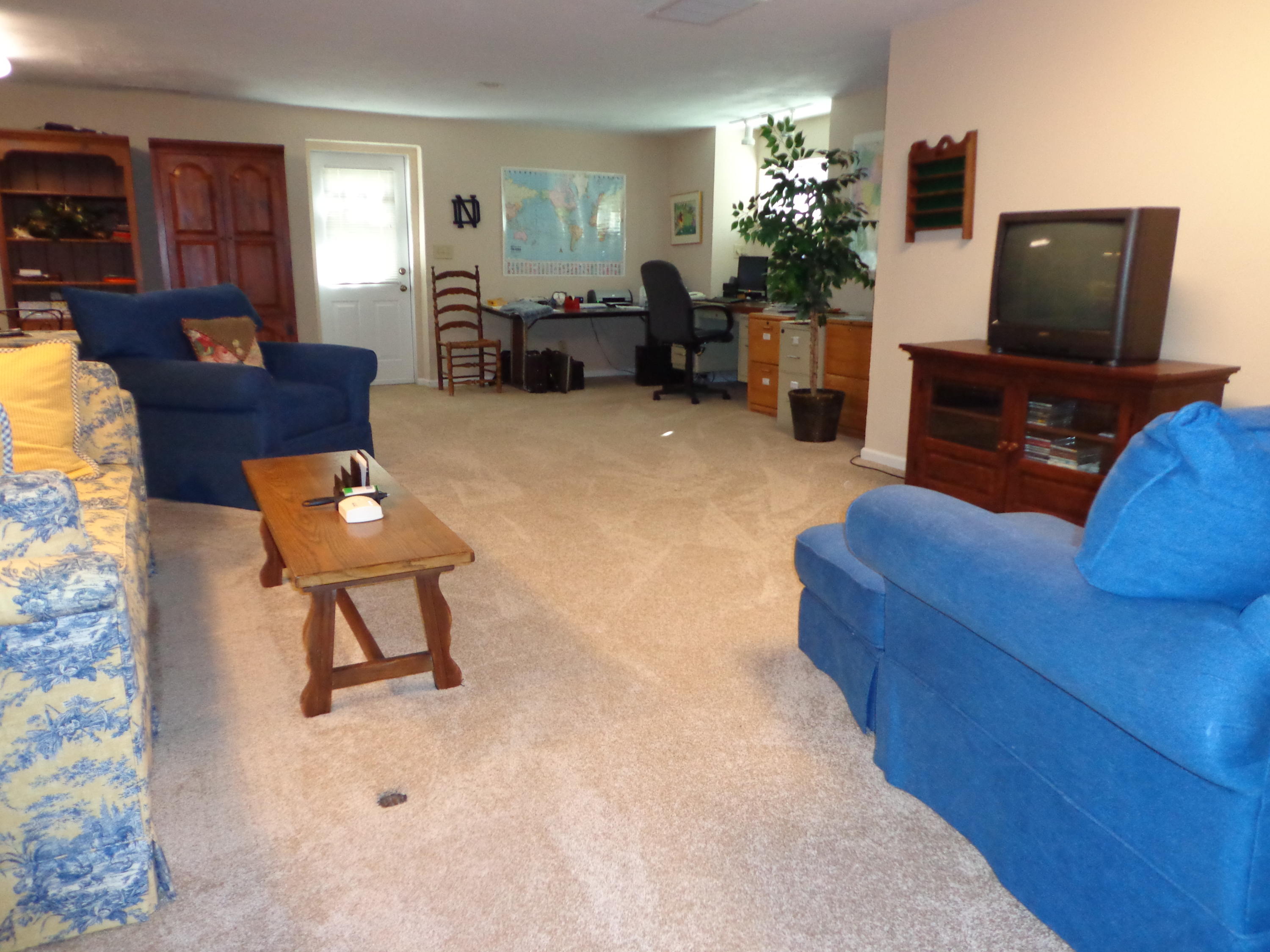 1908 McVitty Road Salem, VA 24153 - Photo 35 of 44 a living room with furniture and a flat screen tv