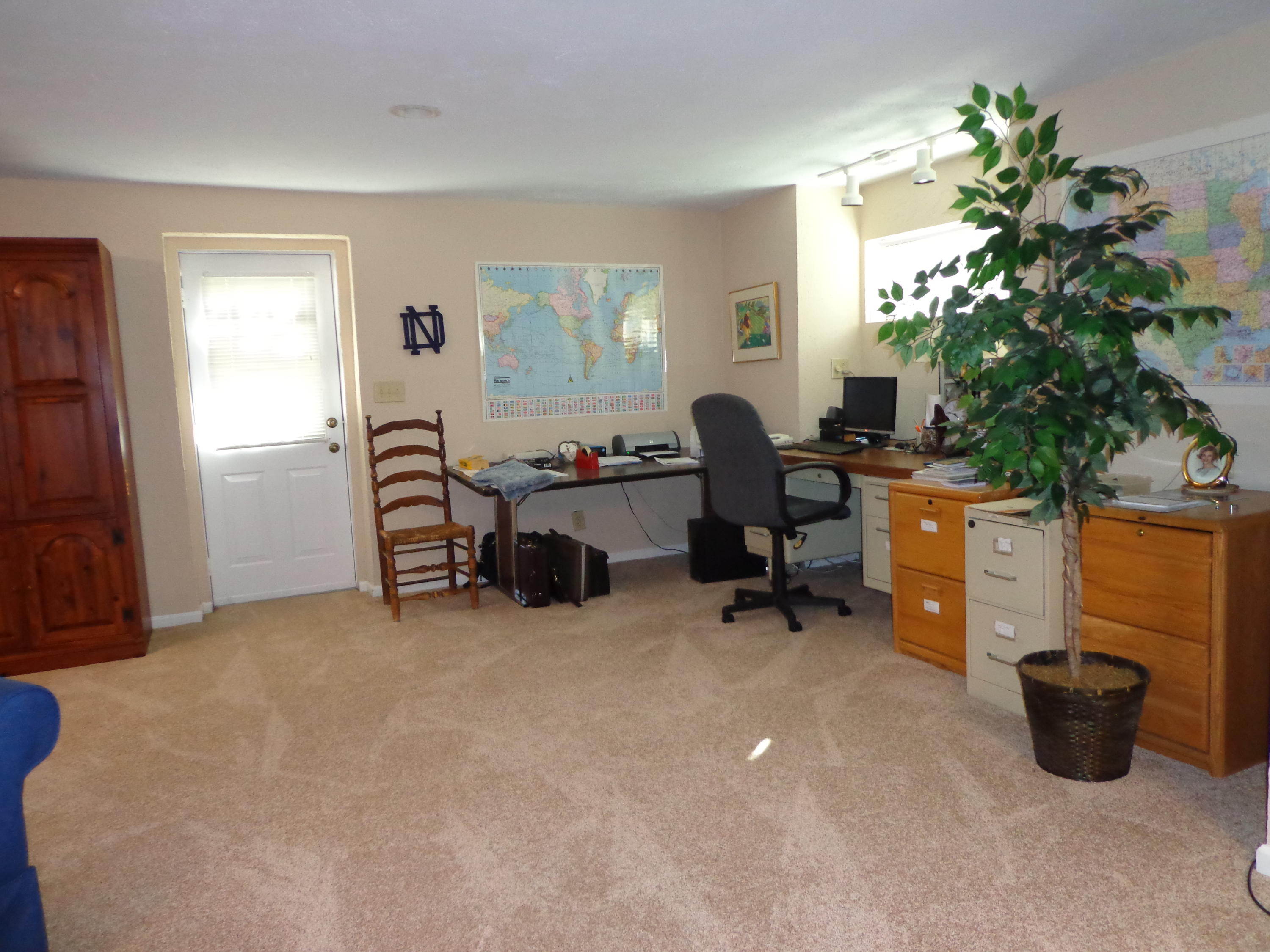 1908 McVitty Road Salem, VA 24153 - Photo 38 of 44 a view of a workspace with furniture and a window