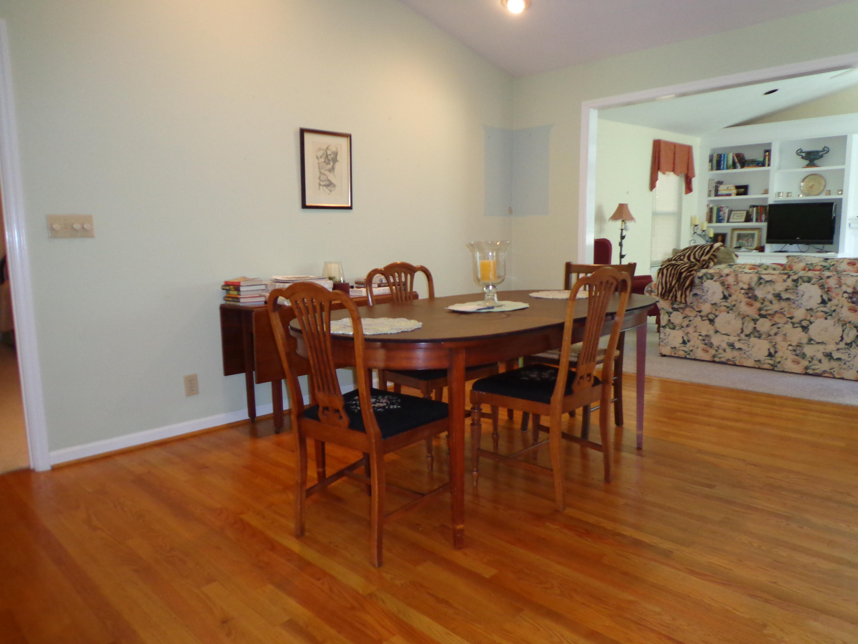 1908 McVitty Road Salem, VA 24153 - Photo 9 of 44 a view of a dining room with furniture and wooden floor