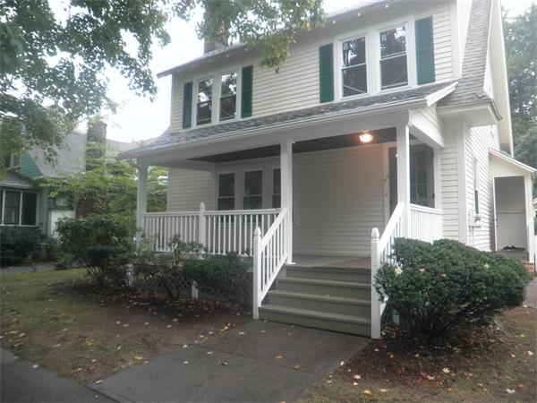 44 Thorndyke Street Springfield, MA 01118 - Photo 1 of 17 a view of a house with a yard