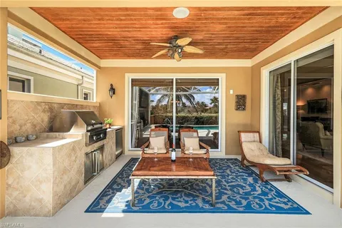 a view of a patio with a backyard
