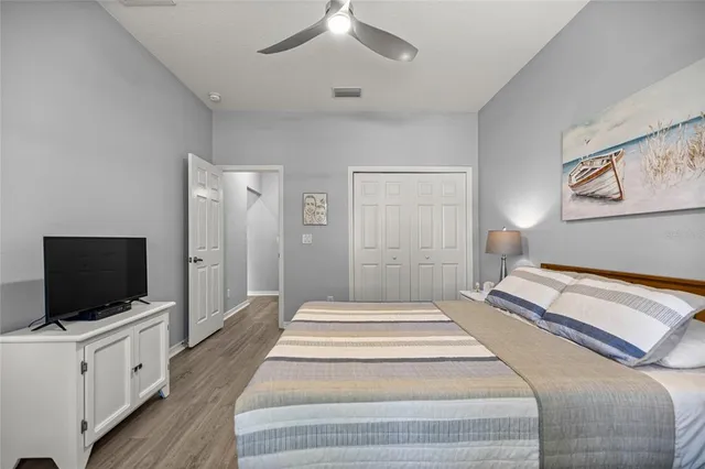 an aerial view of a house with a lake view