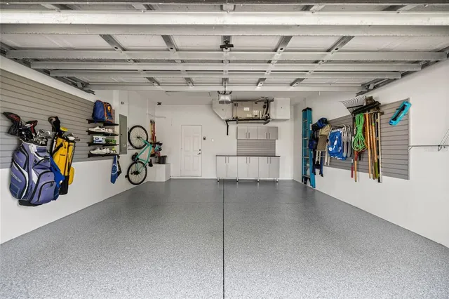 an aerial view of residential house with outdoor space and swimming pool