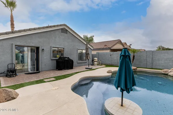 a house view with a garden space
