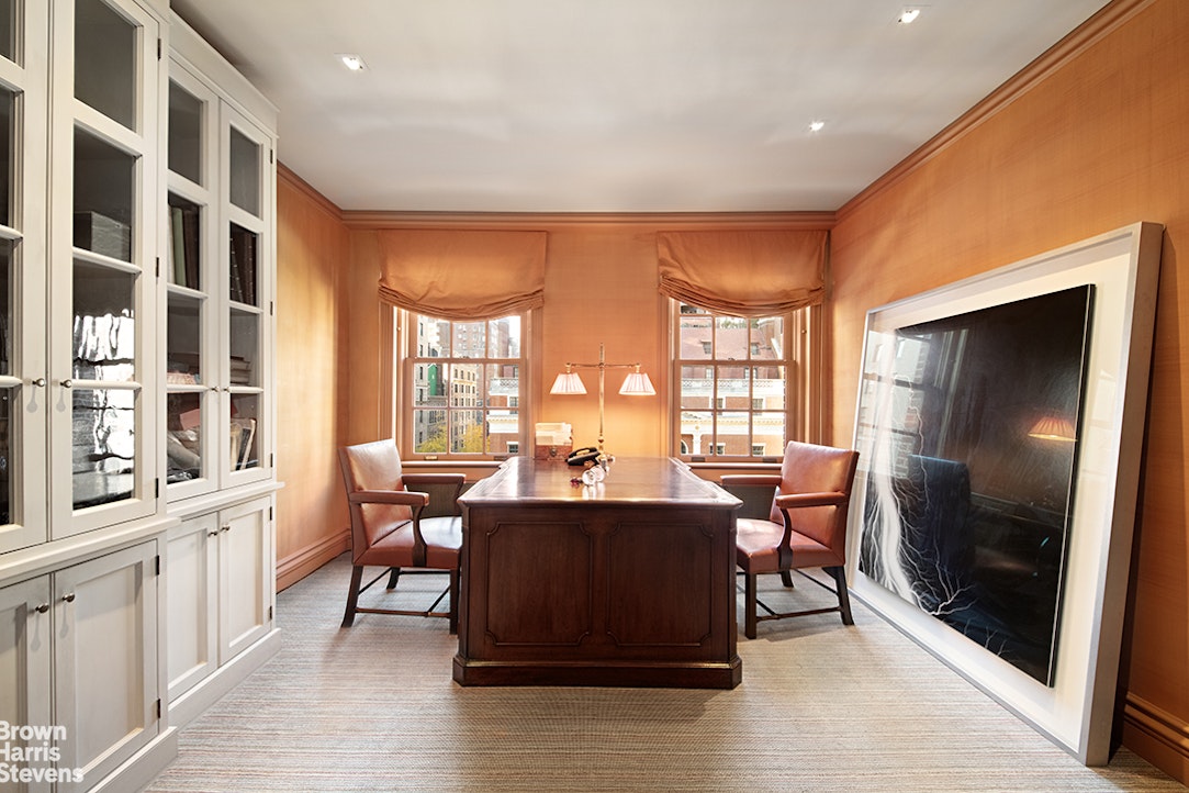 563 Park Avenue, Unit 5/6W Manhattan, NY 10065 - Photo 10 of 13 a view of a dining room with furniture window and wooden floor