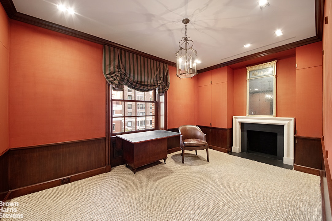 563 Park Avenue, Unit 5/6W Manhattan, NY 10065 - Photo 12 of 13 a view of livingroom with furniture chandelier and front door